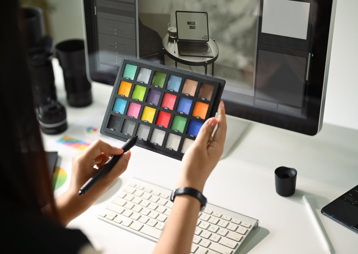 photographer editing photos computer